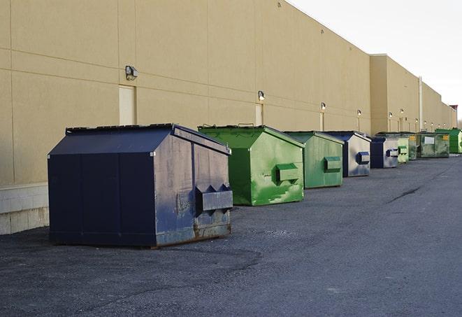 a large dumpster serves as a temporary waste container on a job site in Atlanta